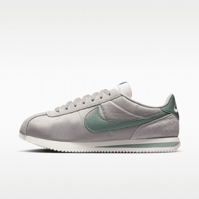 Nike Cortez Textile in College Grey, Sail, and Clay Green colorway on white background